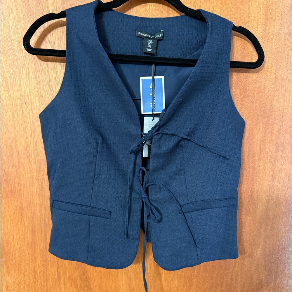 Sincerely Jules Vest